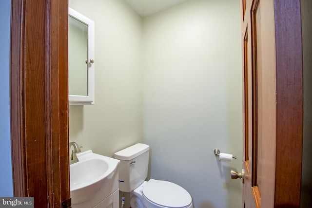 bathroom with sink and toilet