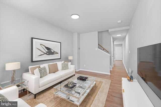 living room with light hardwood / wood-style floors