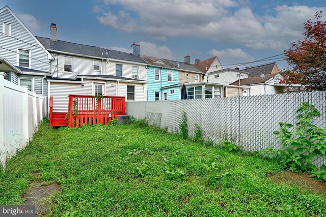 view of yard with a wooden deck