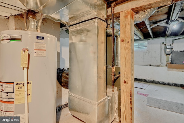 utility room featuring water heater