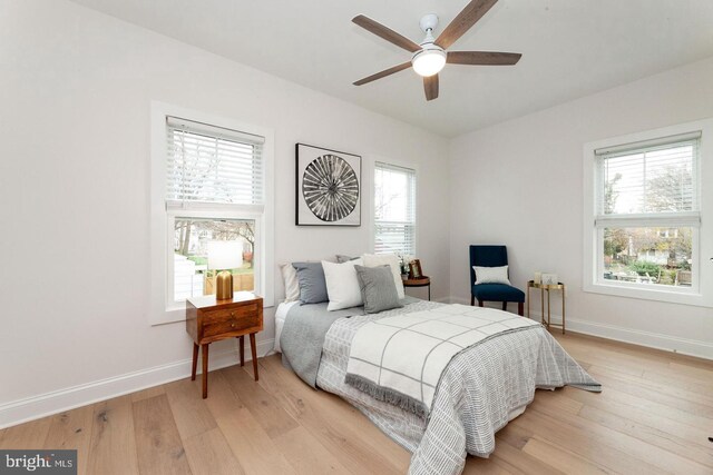 bedroom featuring ceiling fan and light wood-type flooring