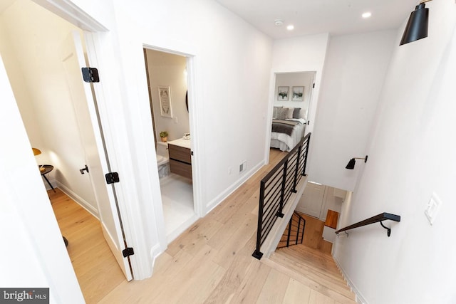 hallway featuring light hardwood / wood-style floors