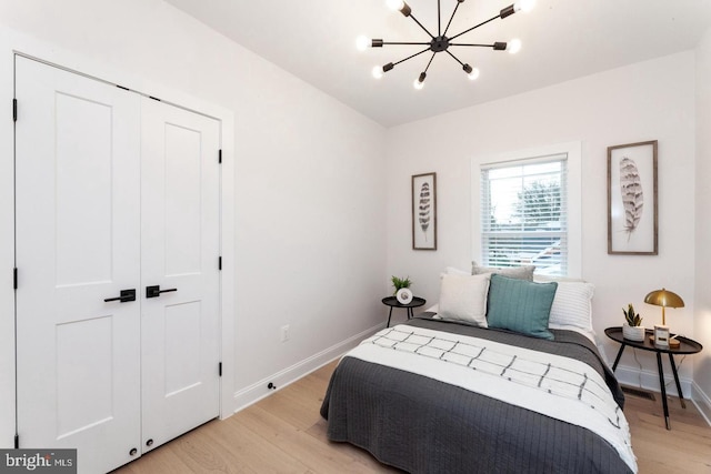 bedroom featuring a closet and light hardwood / wood-style floors