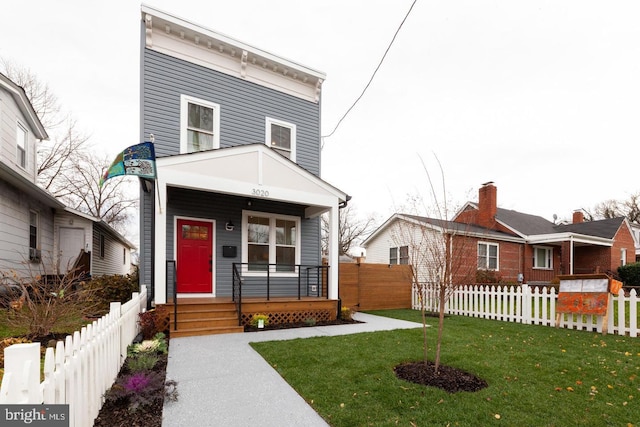 view of front of home with a front yard