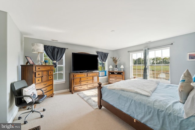 bedroom with light carpet