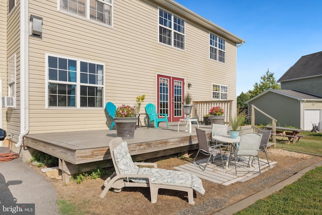 back of property with a wooden deck