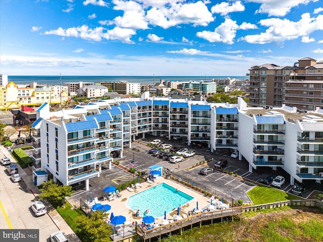 birds eye view of property featuring a water view