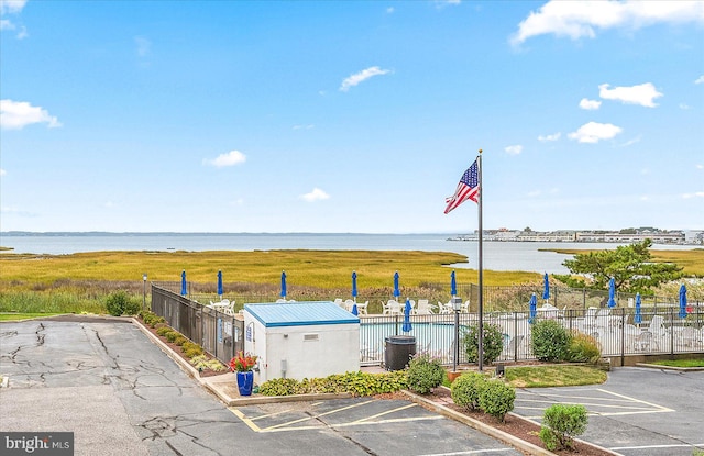 view of building exterior with a water view