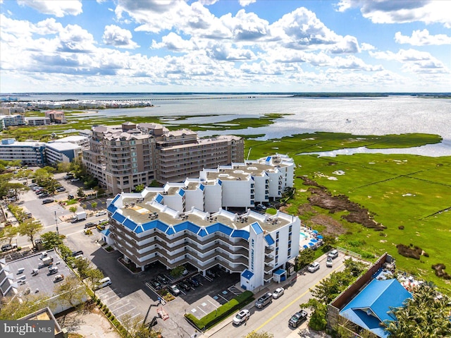 birds eye view of property featuring a water view