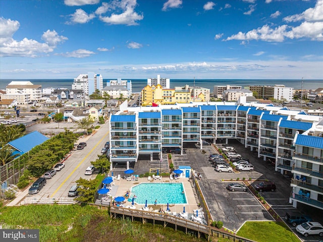 birds eye view of property featuring a water view