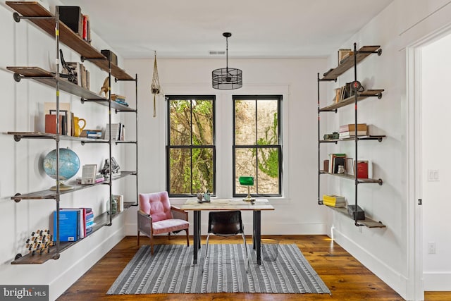 living area featuring dark wood-type flooring