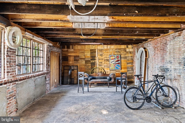 basement with brick wall