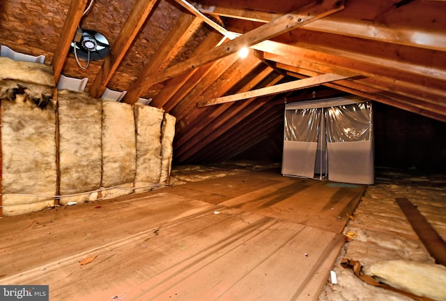 view of unfinished attic