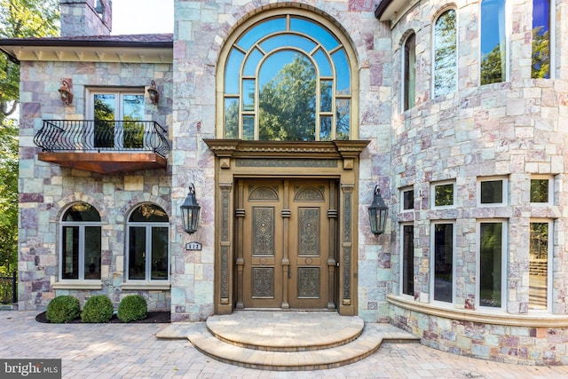 doorway to property with a balcony