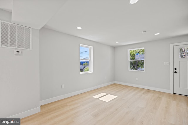 empty room with light wood-type flooring