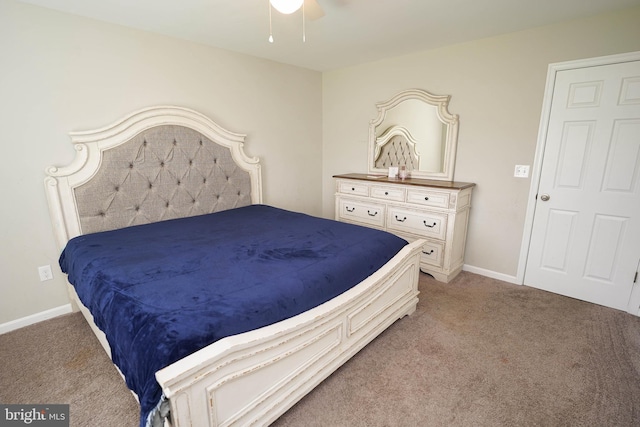 bedroom featuring light colored carpet