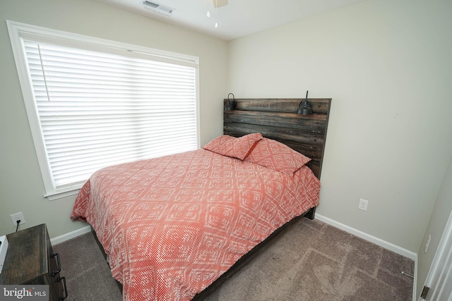 carpeted bedroom with ceiling fan