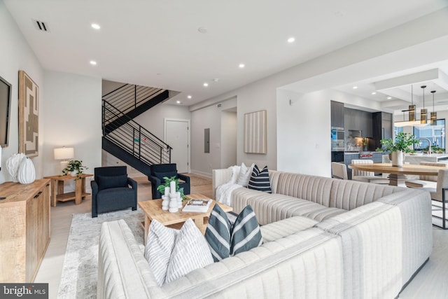 living room with light hardwood / wood-style floors