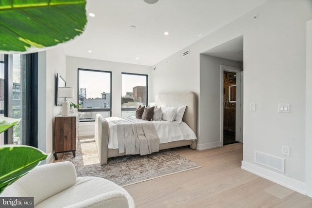 bedroom featuring light hardwood / wood-style flooring