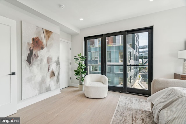 interior space with light wood-type flooring and access to exterior