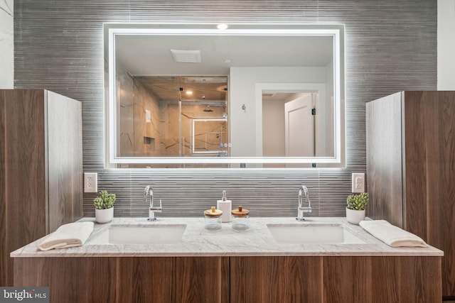 bathroom with vanity and decorative backsplash