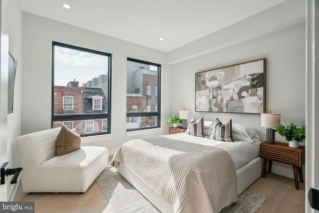 bedroom with light hardwood / wood-style floors