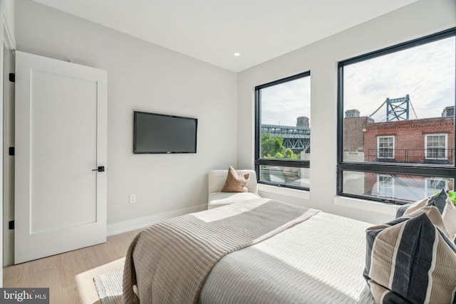 bedroom featuring light hardwood / wood-style floors