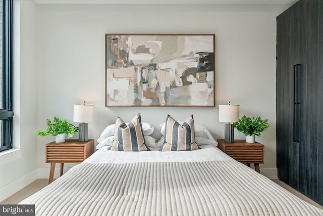 bedroom featuring light hardwood / wood-style flooring