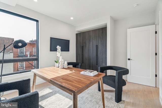 office space featuring light wood-type flooring