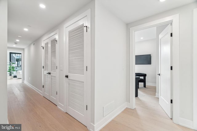 hallway featuring light hardwood / wood-style floors