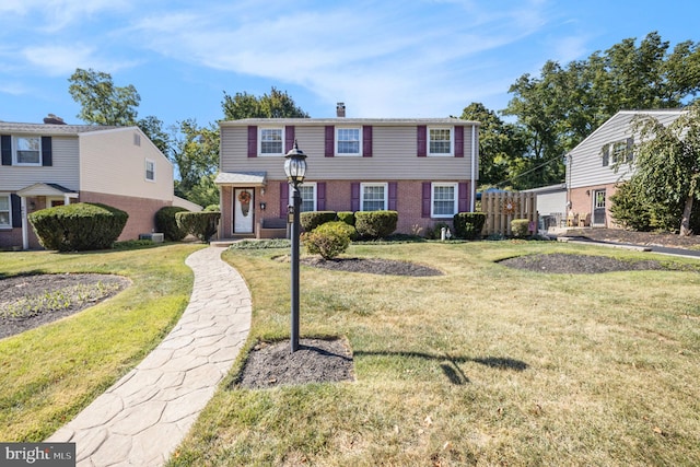 view of front of property featuring a front yard