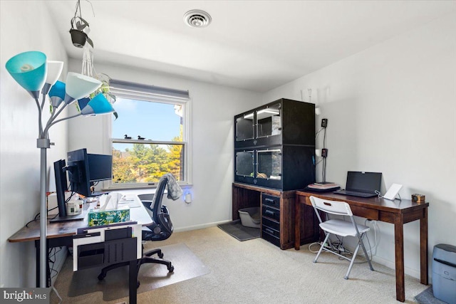 view of carpeted office space