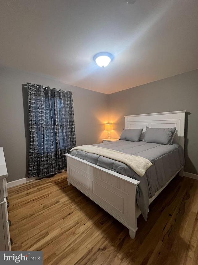 bedroom featuring light hardwood / wood-style floors