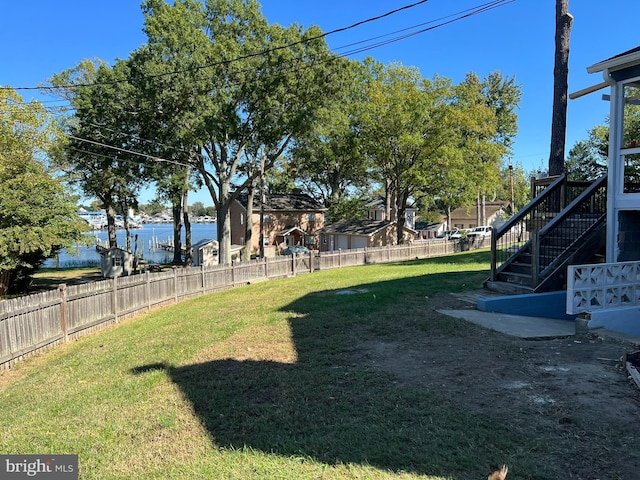 view of yard with a water view