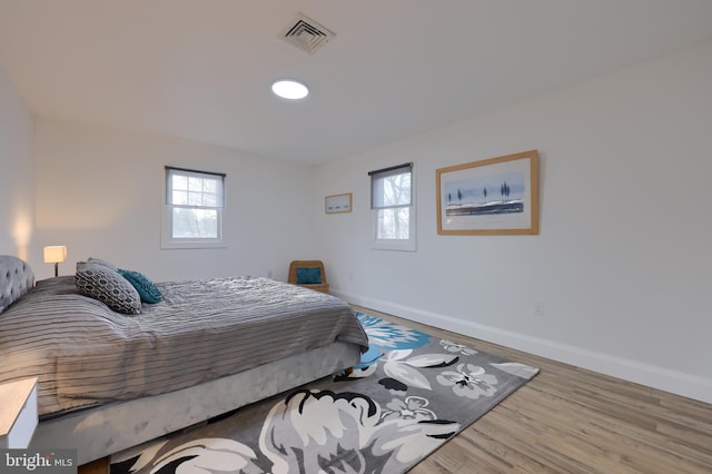 bedroom featuring wood-type flooring