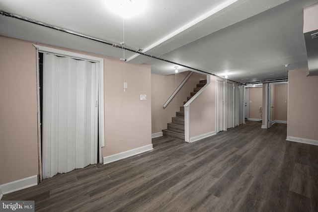 basement featuring dark wood-type flooring