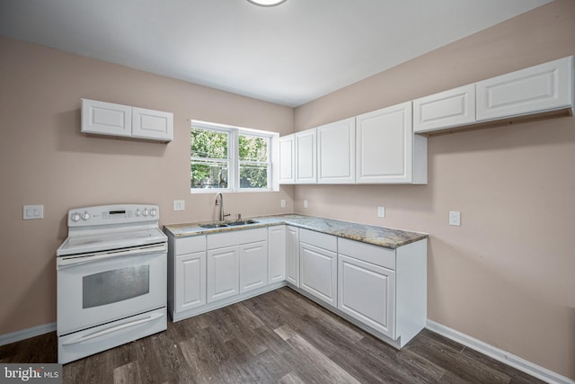 kitchen with white electric range, white cabinetry, sink, and dark hardwood / wood-style floors