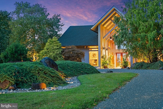 view of front of house with a yard