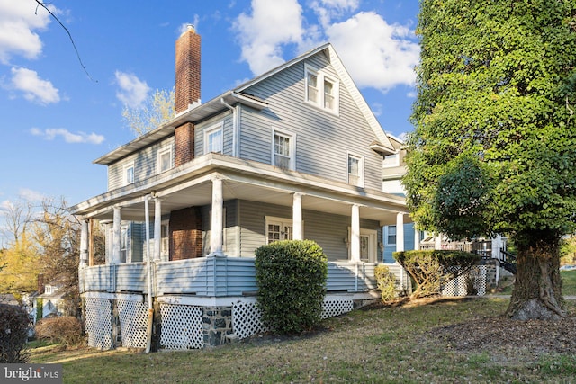 view of front of home featuring covered porch