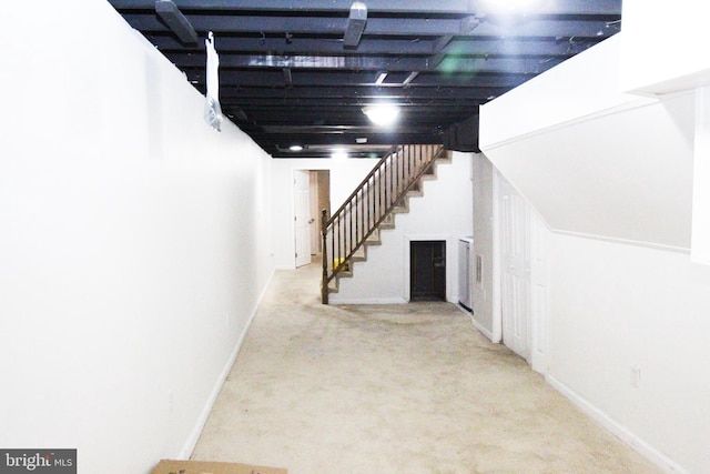 basement with light carpet