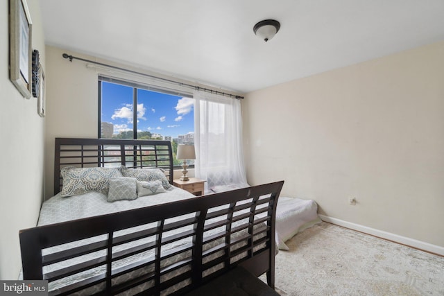 bedroom featuring carpet