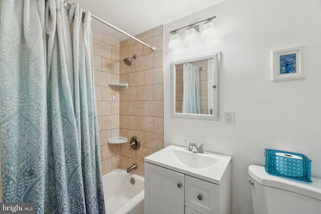 full bathroom featuring vanity, toilet, and shower / tub combo with curtain