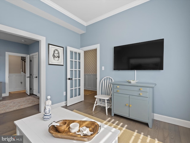 interior space featuring ornamental molding, french doors, and dark hardwood / wood-style flooring