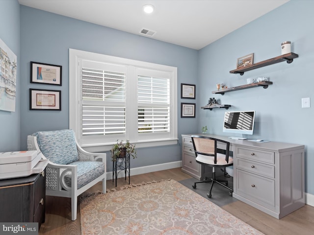 office space featuring light hardwood / wood-style floors