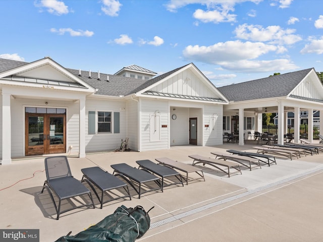 back of house with a patio