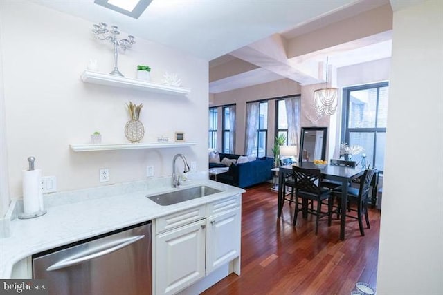 kitchen featuring dishwasher, light stone countertops, white cabinetry, sink, and dark wood-type flooring