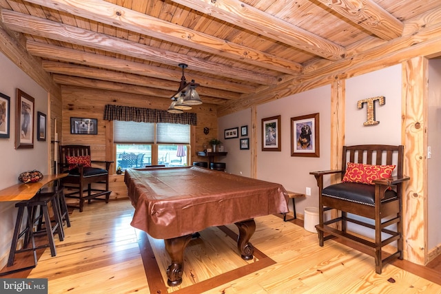 recreation room with light hardwood / wood-style flooring, wood ceiling, pool table, and beamed ceiling