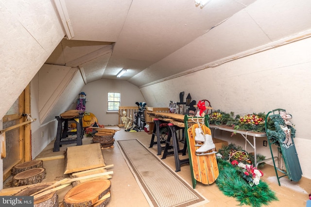 bonus room featuring lofted ceiling