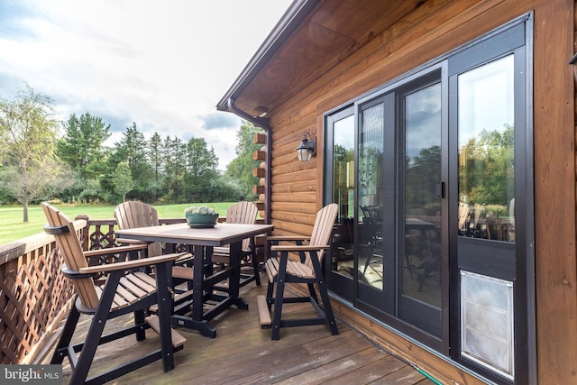 wooden deck featuring french doors