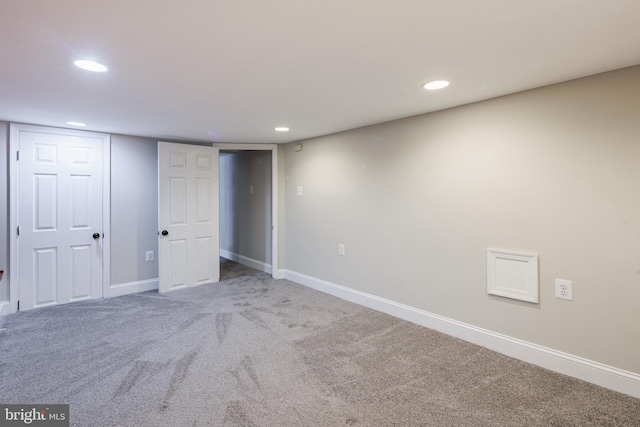 basement featuring carpet